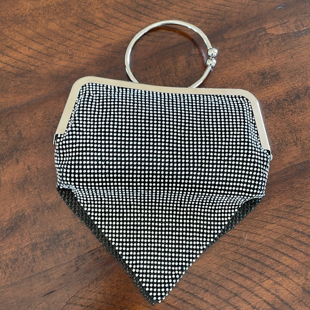 Studded purse can be worn as Crossbody or carried -perfect condition never used